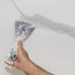 Example of a ceiling crack showing common signs homeowners should watch for.