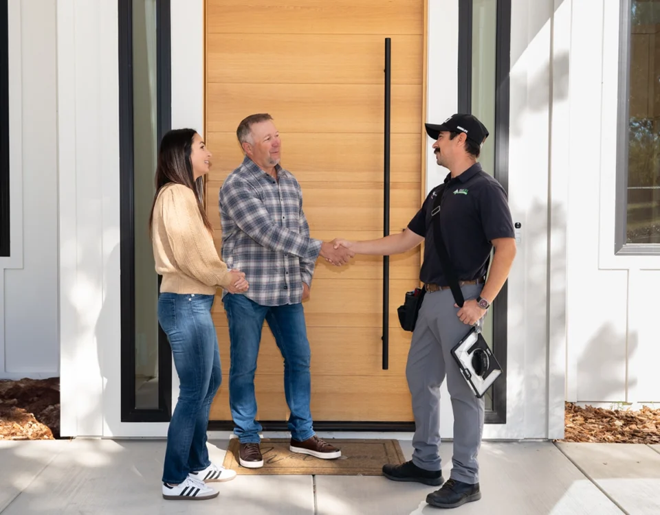 Types of Home Inspections: A Guide to Specialist Checks 4 The homeowners are welcoming Good Life Inspection Home Inspector near the house